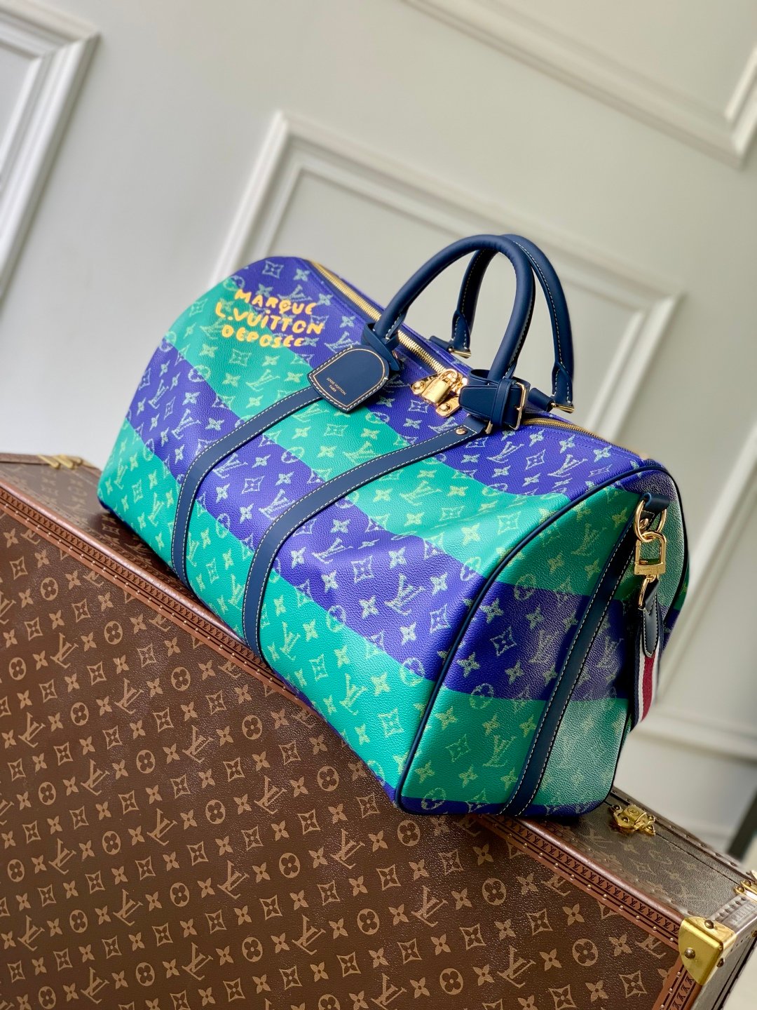 LV復刻版Keepall Bandoulière 50旅行袋Monogram涂层帆布橄榄球條紋